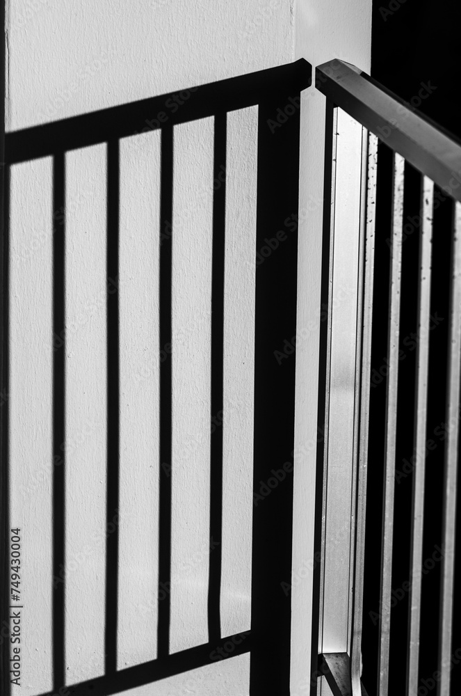 Railing with a Shadow in Monochrome. Railing with a Shadow in Monochrome.