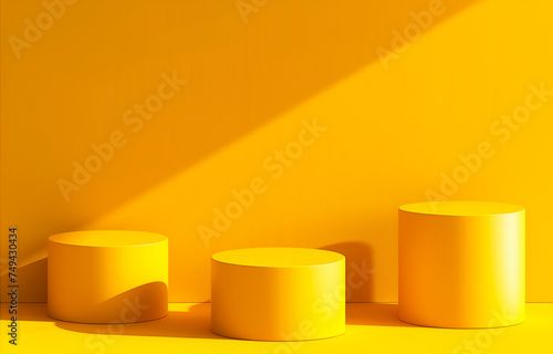 Bright Yellow Display Pedestals with Contrasting Shadows. Three cylindrical yellow display pedestals in a vibrant yellow room with striking light and shadow contrast.