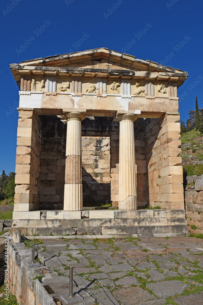 view to the Athenian treasury at the ancient oracle archaeological Delphi site, Greece
view to the Athenian treasury at the ancient oracle archaeological Delphi site, Greece