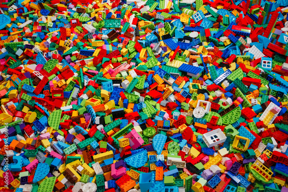 Fototapeta premium Billund, Denmark - 17 June 2023: Multi-colored plastic Lego Duplo brick background