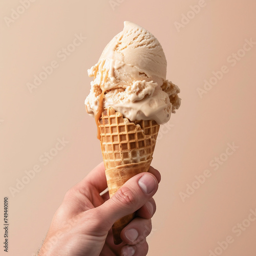 Caramel ice cream isolated on a clean background - ice cream, cone, man's hand, waffle cone 