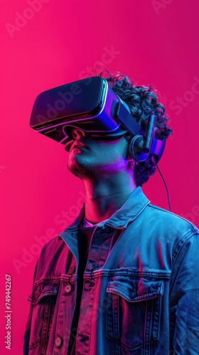 A man is seen wearing a virtual reality headset, fully engaged in the immersive digital experience it provides.