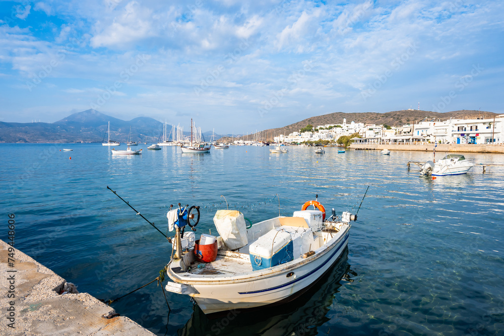 Traditional Greek fishing boat in Adamas port, Milos island, Cyclades, Greece
