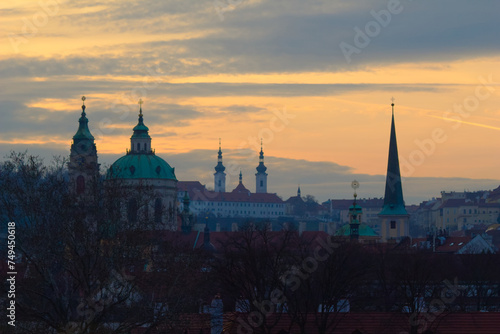 Prague rooftop cityscape view at sunset.