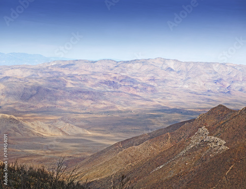 Mountain, valley and natural landscape with blue sky, terrain and scenic view for travel destination. Earth, nature and environment for countryside, outdoor adventure or explore in California.