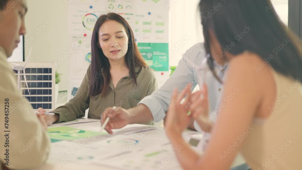 Business Professionals Evaluating ESG Performance Metrics. Business Professionals Evaluating ESG Performance Metrics.