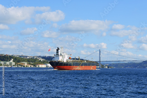 Ship passing the Bosphorus Bridge at Besiktas  Istanbul  Turkey