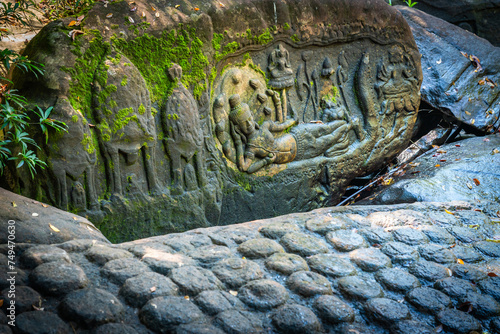Ancient stone carving at Kbal Spean the mystery waterfall on Kulen mountains in Siem Reap province of Cambodia. photo