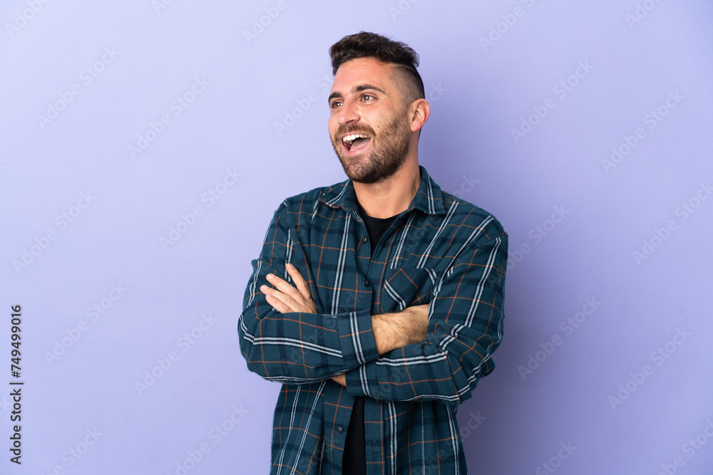 Caucasian man isolated on purple background happy and smiling Caucasian man isolated on purple background happy and smiling