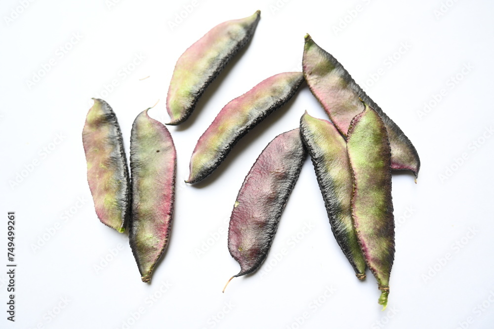 Lablab purpureus vegetable. It is a species of bean in the family Fabaceae. Its other names lablab bean, bonavist bean pea, dolichos bean, seim, lablab, Egyptian kidney bean, Indian bean. Lablab purpureus vegetable. It is a species of bean in the family Fabaceae. Its other names lablab bean, bonavist bean pea, dolichos bean, seim, lablab, Egyptian kidney bean, Indian bean.