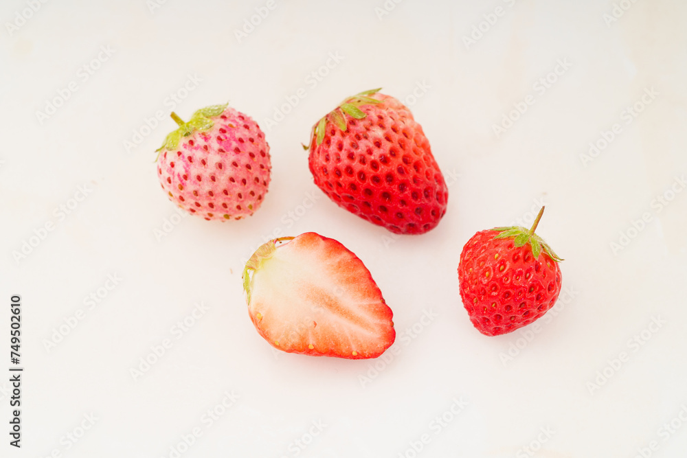Fresh strawberries on monochrome background Fresh strawberries on monochrome background