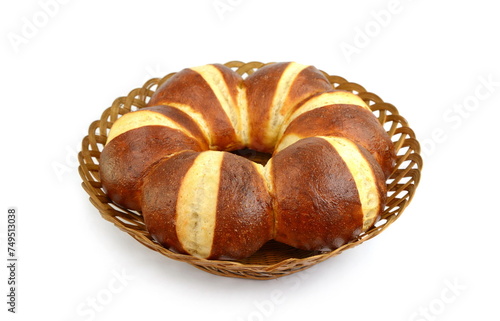 Freshly baked traditional German laugenbrot. Bavarian homemade pretzel rolls lye bread, close-up, isolated on white background. photo