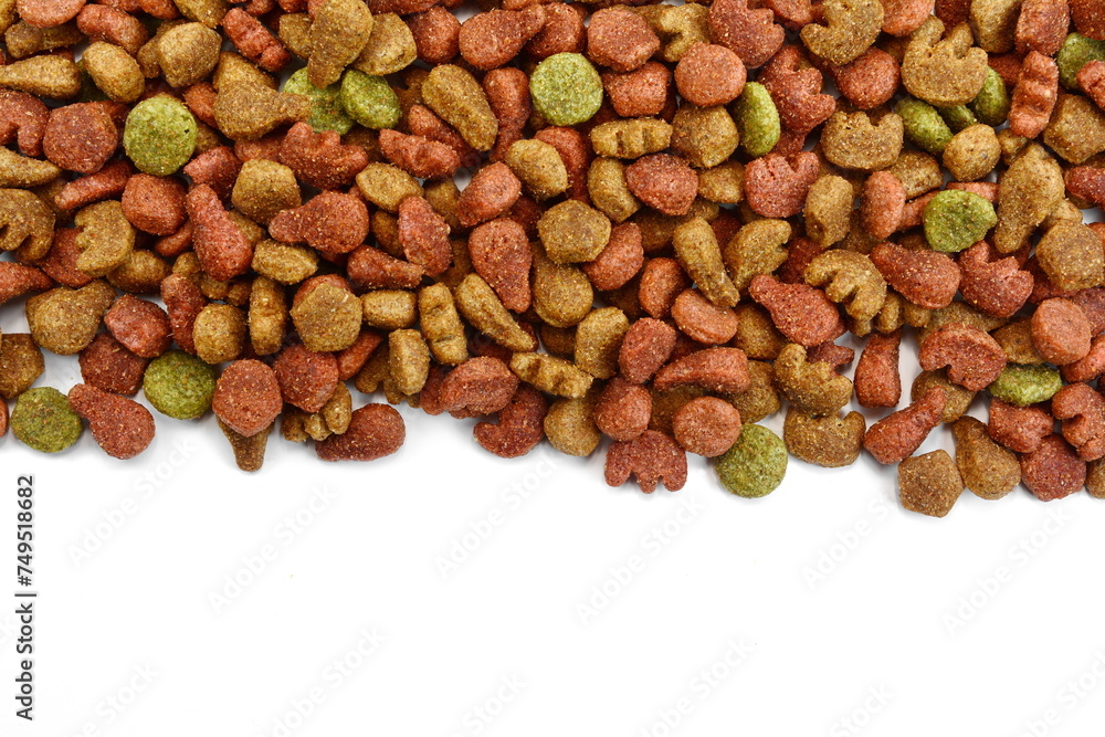 Pile of Dry Pet Food isolated on white background. Dog or cat food isolated. Pile of Dry Pet Food isolated on white background. Dog or cat food isolated.