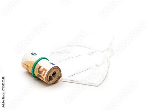 Pandemic Economy: Mask and Money Roll photo