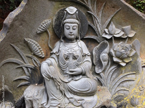 Avalokiteshvara Buddha statue carved in stone in India