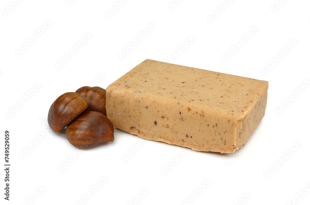 Chestnut puree isolated on white background. Chestnut puree, butter, brick. Chestnut puree bar. Chestnut puree isolated on white background. Chestnut puree, butter, brick. Chestnut puree bar.