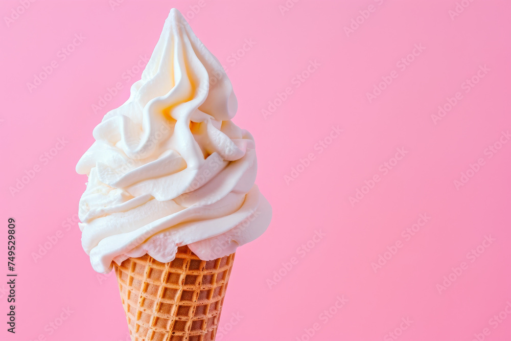 Fototapeta premium Ice Cream Cone With White Icing on Pink Background