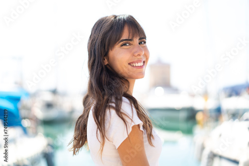 Young woman at outdoors . Portrait