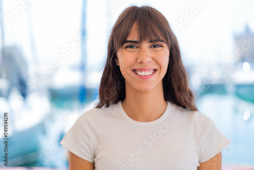 Young woman at outdoors With happy expression Free Download Young woman at outdoors With happy expression - GFXLoad