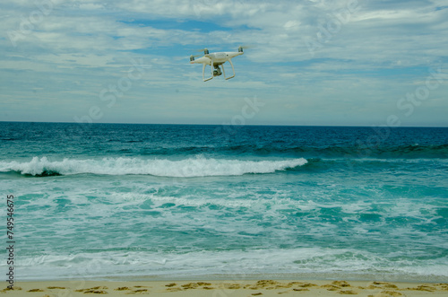 Naklejka Drone flying above sea