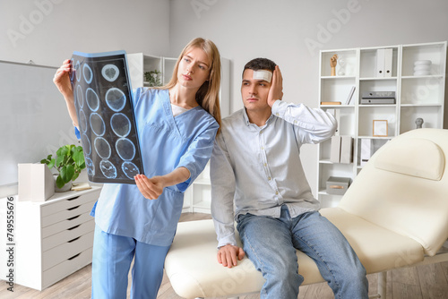 Female doctor and man with ...