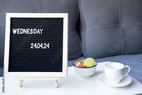 Beautiful date for a wedding 04/24/2024 on a black letterboard on the table