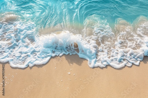 Clear waves washing up on sandy beach - Gentle waves roll onto a pristine sandy shore, symbolizing tranquility and the beauty of nature