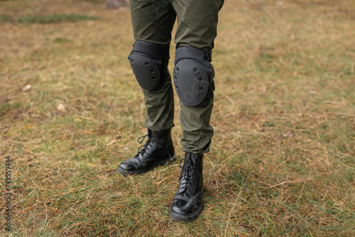 Tactical knee pads protect the legs of soldiers and warriors. Camouflage gear for convenience