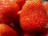 Glistening Jewels of Summer: A Symphony of Flavor Bursting Forth in Luscious, Ripe Strawberries