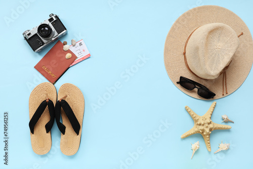 Composition with beach accessories  passport  ticket and photo camera on color background. International Women s Day