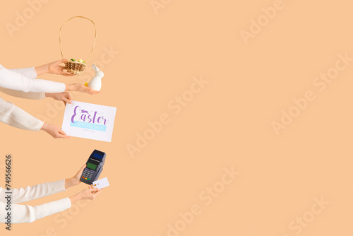 Women with payment terminal...