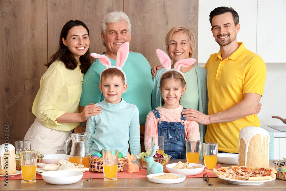 Big family at Easter dinner in kitchen Big family at Easter dinner in kitchen
