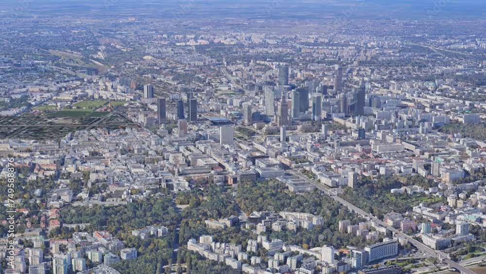 Aerial view of the Warsaw cityscape with historic buildings, market square, Cathedral in old town and modern skyscrapers at background. Circular movement around of Warsaw, Poland Aerial view of the Warsaw cityscape with historic buildings, market square, Cathedral in old town and modern skyscrapers at background. Circular movement around of Warsaw, Poland