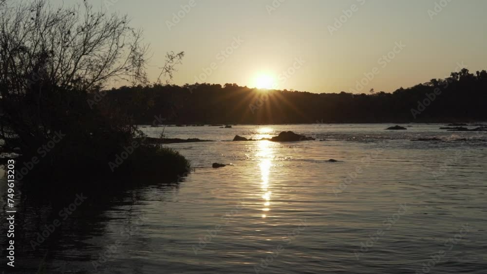romantic sunset over some rapids of a remote river in southern Brazil. romantic sunset over some rapids of a remote river in southern Brazil.