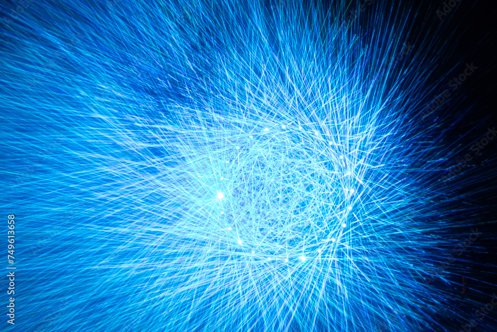 Laser projections with light blue rays. The play of cosmic rays and light Laser projections with light blue rays. The play of cosmic rays and light