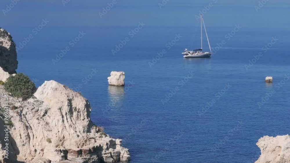Aerial view of beautiful yacht. Boat on the sea at sunset in summer. island, Greece. Top view of luxury yachts, sailboats, clear blue water, sky, mountain. Travel. Cruise vacation, blue sea lagoon Aerial view of beautiful yacht. Boat on the sea at sunset in summer. island, Greece. Top view of luxury yachts, sailboats, clear blue water, sky, mountain. Travel. Cruise vacation, blue sea lagoon