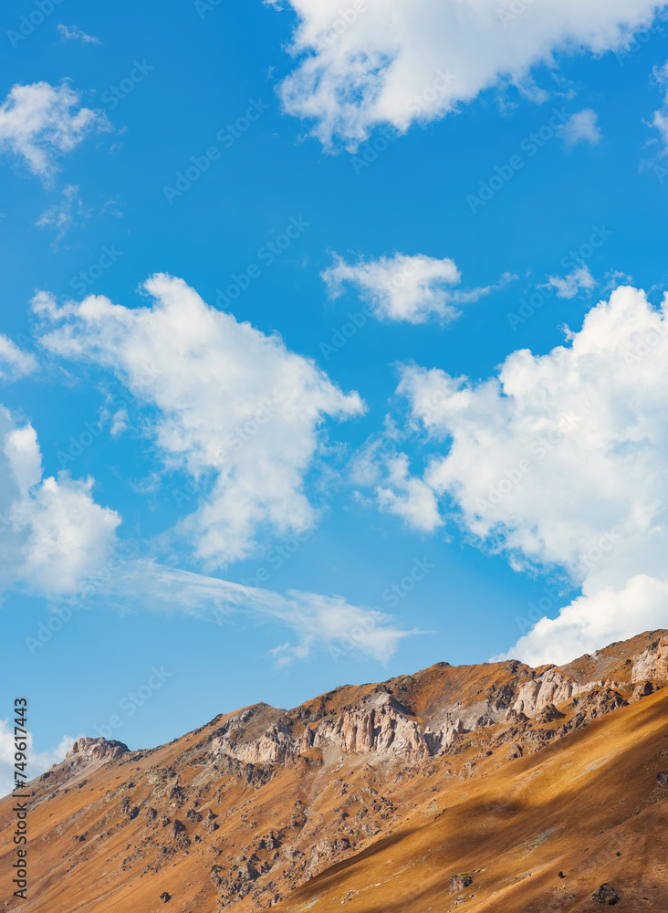 beautiful view of mountains and blue cloudy sky