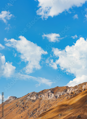 beautiful view of mountains and blue cloudy sky