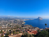 Beautiful panorama of Calpe, Spain with harbor and skyline, Penon de Ifach mountain, beach and countryside scenery
