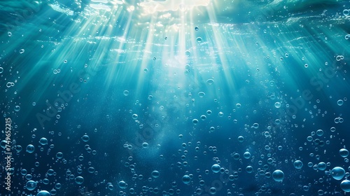 Underwater background with water bubbles and undersea light rays shine photo