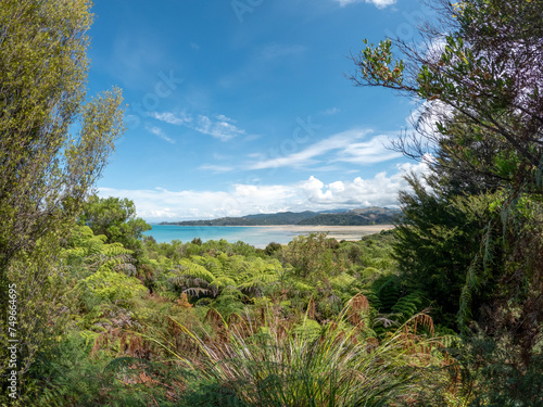 Marahau : Abel Tasman National Park stunning coastal landscape of featuring golden beaches, crystal-clear waters, and lush native bush © nomadkate