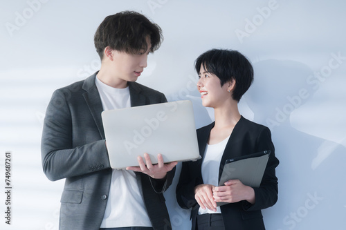 Businessman having a meeting while looking at presentation materials