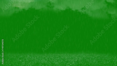 Rain with thunderstorm on green screen. Clouds accompanied by lightning strikes heavy rain, thunderstorms on a green screen