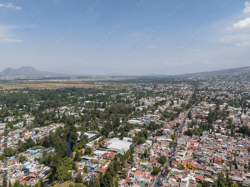 Aerial views of the southeast of Mexico City, Xochimilco in the foreground