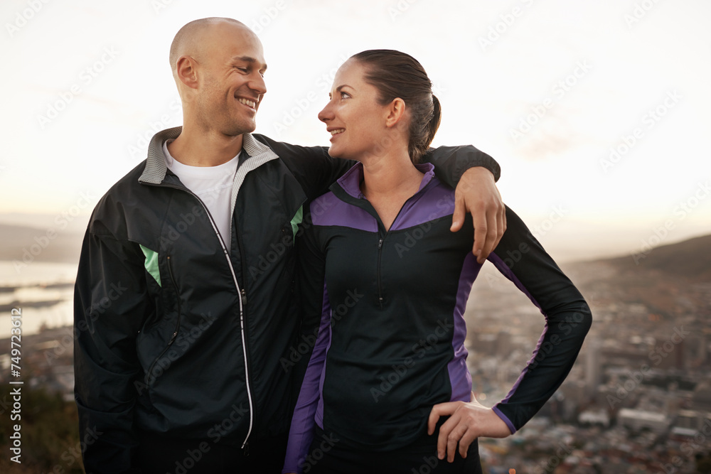 Happy couple, fitness and mountain with hug for workout, exercise or outdoor training together. Young man and woman with smile, love or support for hiking, running or health and wellness in nature Happy couple, fitness and mountain with hug for workout, exercise or outdoor training together. Young man and woman with smile, love or support for hiking, running or health and wellness in nature