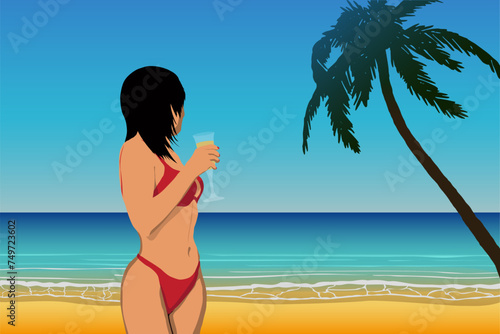 woman in bikini holding a glass and looking into the distance on a sandy beach near the ocean on a sunny summer day