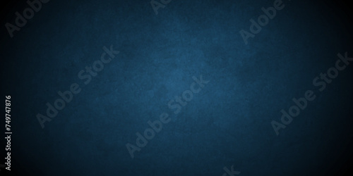 Grunge abstract Elegant dark solid blue background with elegant border and used for blue wall , a versatile backdrop for website banners, social media posts. Abstract rough blue grunge backdrop.