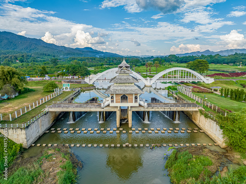 Aerial view, Tha Chomphu White Bridge. It is a railway bridge across the river and is a beautiful white arch shaped cement bridge. It is an important tourist attraction lamphun province, thailand.