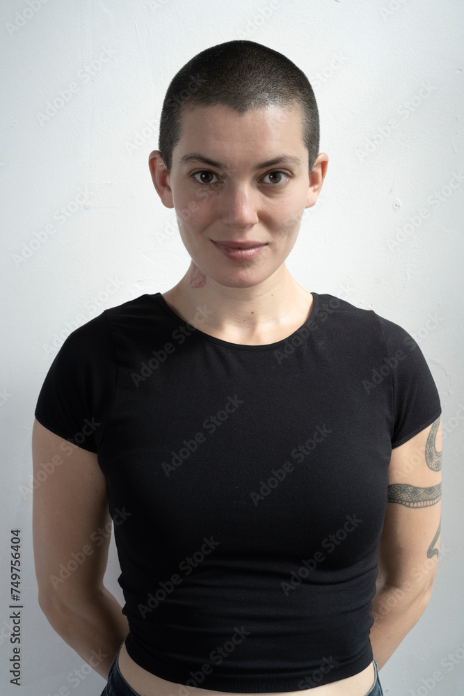 Obraz premium Downtown LA Resident poses in studio wearing a form fitting outfit.