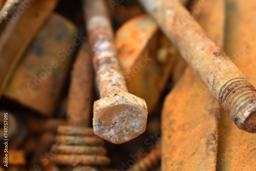 Dirty old rusty tools texture background. Blurred photo of mechanic items.
